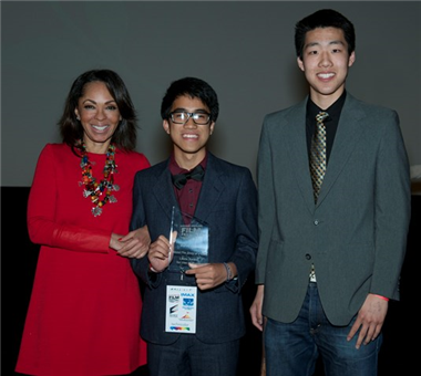 Niblet: The Story of a Can director Marvin Pham accepts the Lizzie Award for Use of Music from speaker Debra Martin Chase.